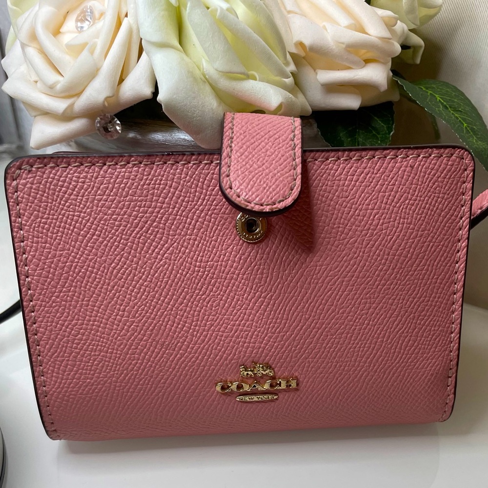 Authentic Coach wallet, small pretty in pink.